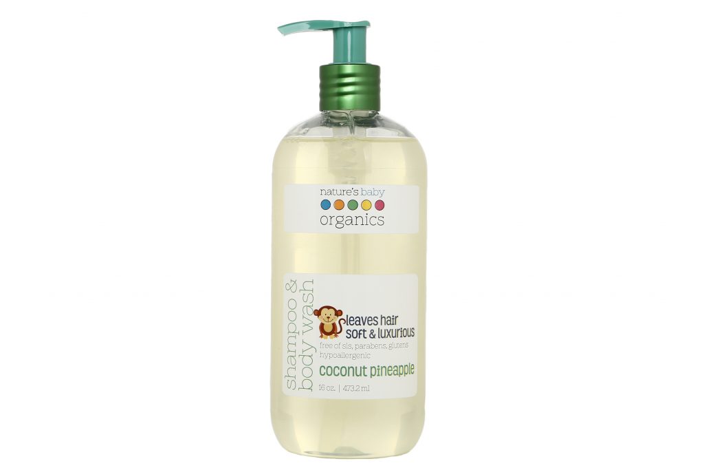 A 16 oz. bottle of Nature's Baby Organics Coconut Pineapple Shampoo and Body wash. White background.